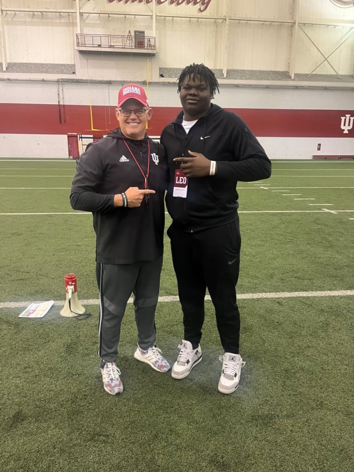 Indiana coach Tom Allen (left) and 2024 offensive lineman commit Adedamola Ajani during a visit on March 28, 2023.
